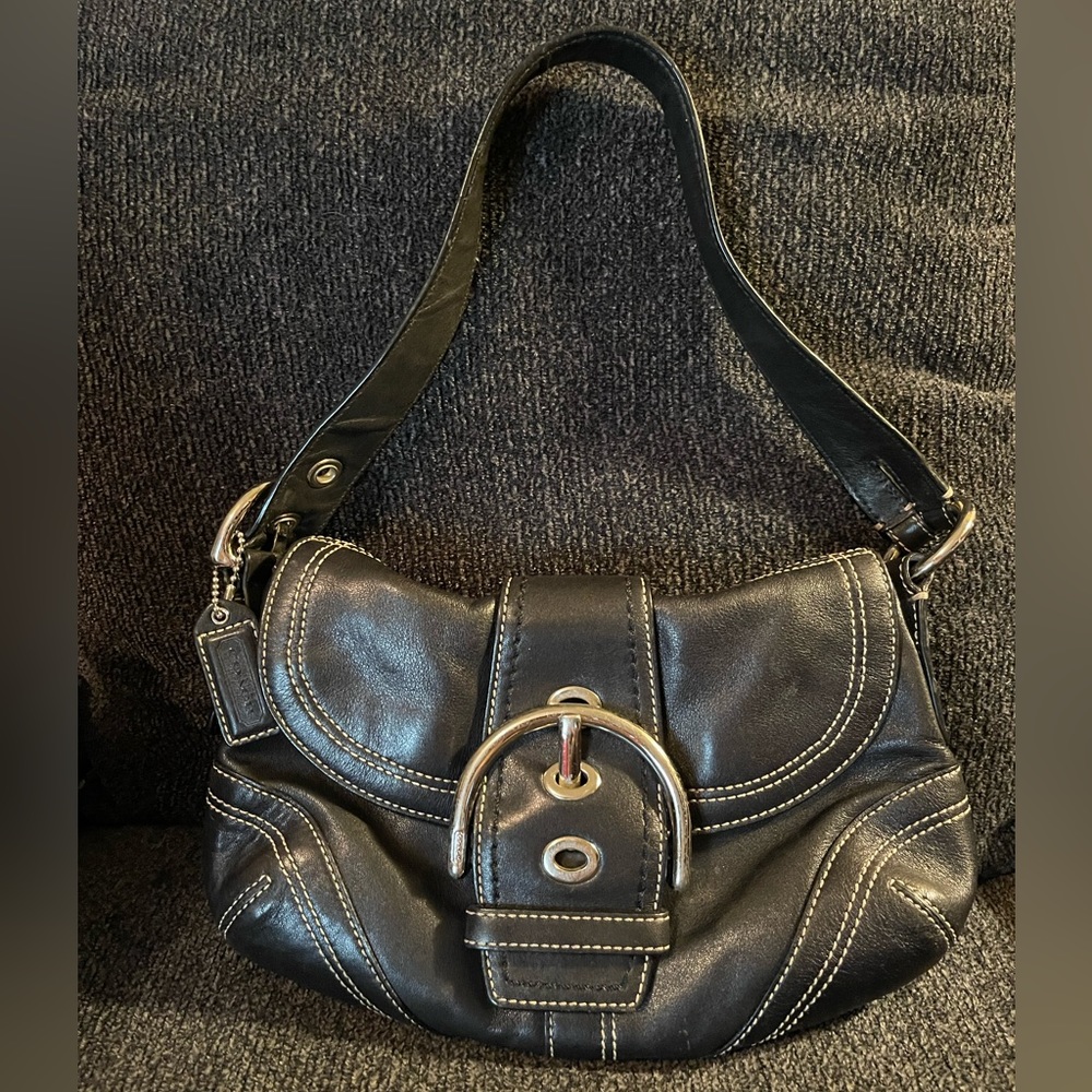 Coach in black leather